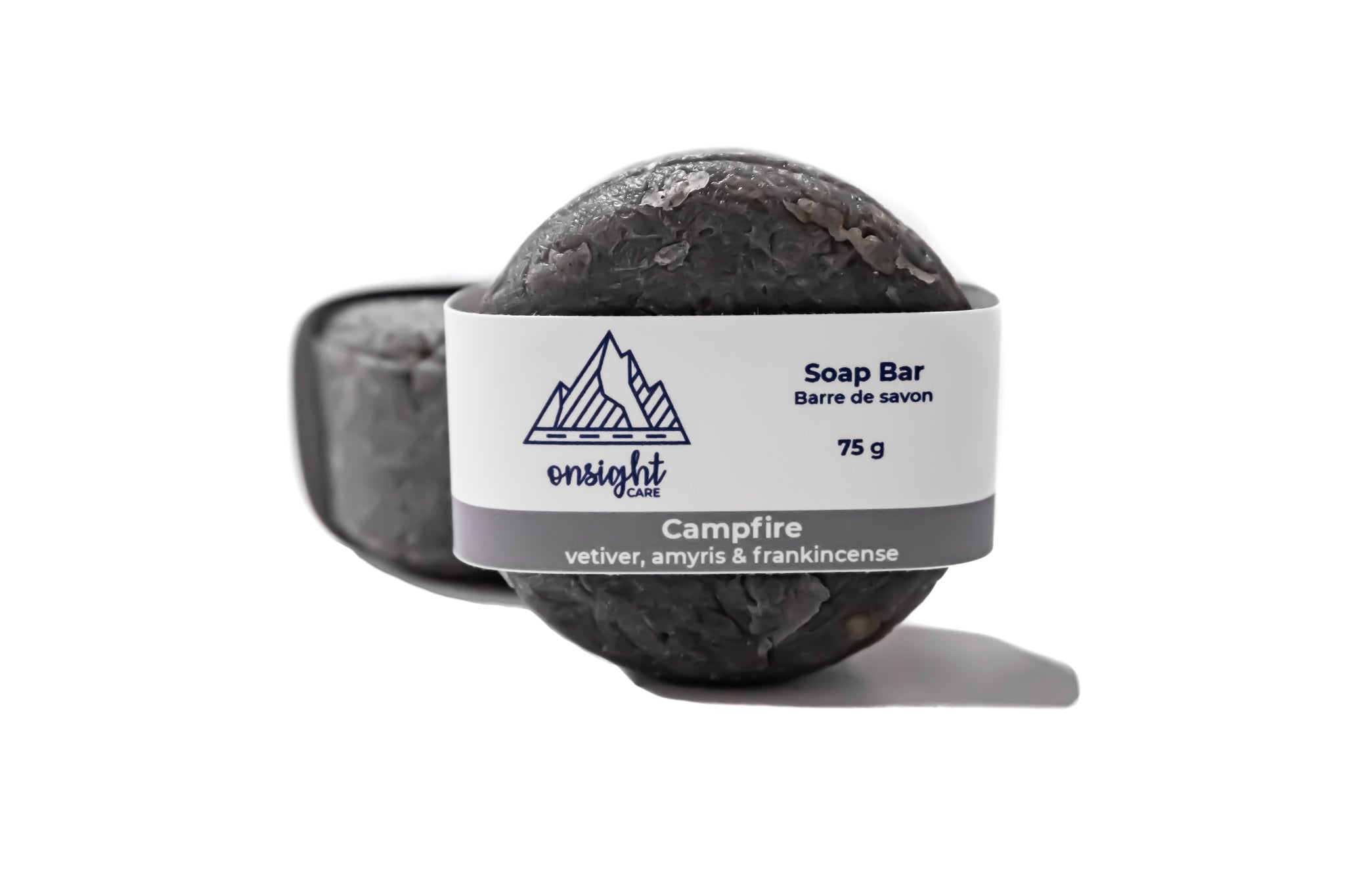 circle charcoal soap bar with grey label