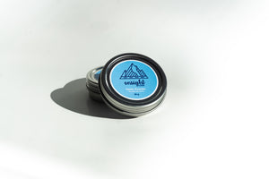 blue labelled mint tooth powder tins